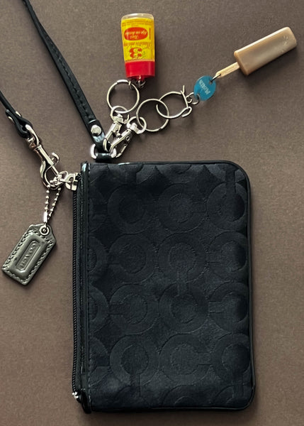 Coach Wristlet w/ 60's Charms